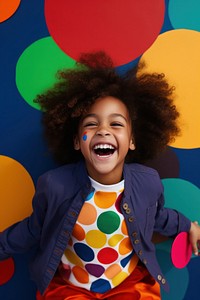 Happy black girl playing laughing portrait balloon.
