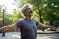 Man stretching before exercise laughing portrait smile.