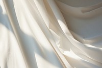 White sheet backgrounds silk crumpled.