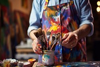Painter holding paintbrush workshop painter art.
