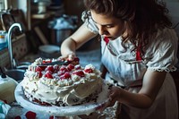Women bake cake dessert adult food.