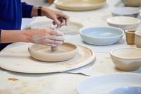 Women workshop a painting ceramics plate adult art.