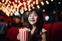 Popcorn smiling holding adult.