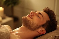 Man enjoying massage in spa adult skin bed.