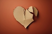 2d heart broken symbol made of cardboard paper textured damaged cracked.