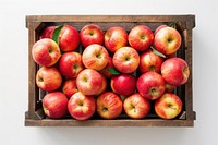 Flat lay apples fruit crate plant.