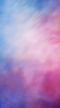 A blue and a pink smooth gradient blur background backgrounds textured outdoors.