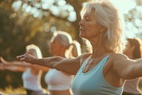 Woman group in sporty outfit doing yoga sports outdoors adult.