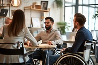 Man in wheelchair talking adult togetherness.