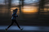 Woman jogger running jogging long exposure.