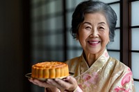 Asian mature woman cake dessert adult.