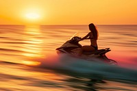 Attractive young woman riding a aquabike at sunset vehicle sports adult.