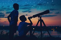 Boy and his father observe the night sky telescope outdoors togetherness.