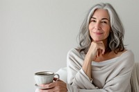 Mature woman in tea time portrait coffee adult.