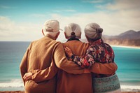 3 friends latino elderly sea outdoors vacation.