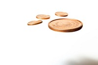 Photo of flying coin money white background investment.