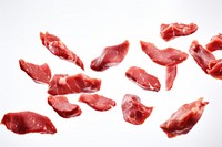 Photo of flying meats food red white background.