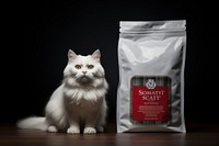 Scottish cat with cat food product white bag mammal animal pet.