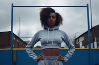 Black woman in sportswear exercise adult architecture.