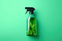 Spray cleaner bottle green plant.