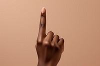 The finger of a woman displaying the okay sign hand skin cosmetics.