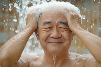 South east asian man cleaning body bathing adult relaxation.
