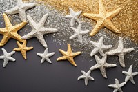 Starfish icon shape glitter gold celebration.