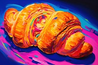 A croissant painting food blue.