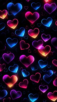 Heart shaped neon light pattern backgrounds purple.