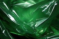 Cellophane texture green plastic backgrounds.
