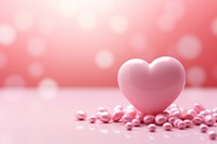 Valentine day on heart pink background pill medication medicine.