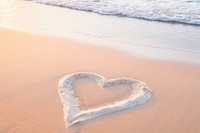 Heart sand sea tranquility.