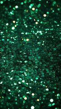 Green glitter light illuminated backgrounds.