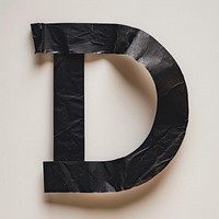 Tape letters D number black text.