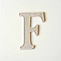 Patch letter F text white background simplicity.
