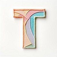 Patch letter T symbol white background creativity.