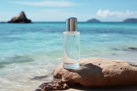 Cosmetic bottle have label put on beach with sea water cosmetics outdoors perfume.