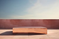 Rose gold color furniture outdoors wall.