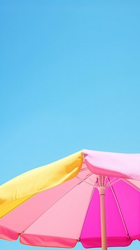Colorful summer umbrella protection relaxation.