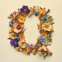 Alphabet Q font flower wreath plant.