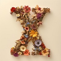 Alphabet X font flower art pattern.