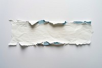 Blue ripped paper white torn art.