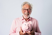 Man holding his piggy bank glasses adult happy.