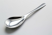 3d render of a spoon in surreal abstract style metal silverware simplicity.