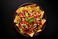 Bowl of nachos food snack plate.