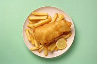 Fish and chips put in plate with tatar sauce side of plate food condiment freshness.