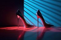 Photo of pair of high heels footwear fashion light.