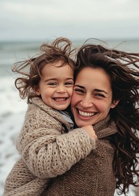 Mother and child smile laughing portrait.