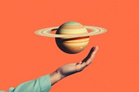 Hand holding saturn planet space astronomy.