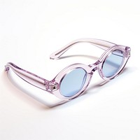 Small slim oval transparent sunglasses white background accessories flip-flops.